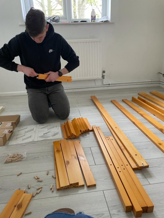 This is Mike putting a bed together for one of the young people who secured their tenancy  